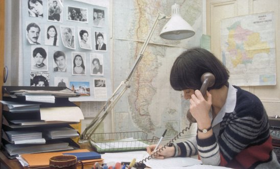 Telefundraising employee at Amnesty International on the phone Telefundraising employee at Amnesty International on the phone